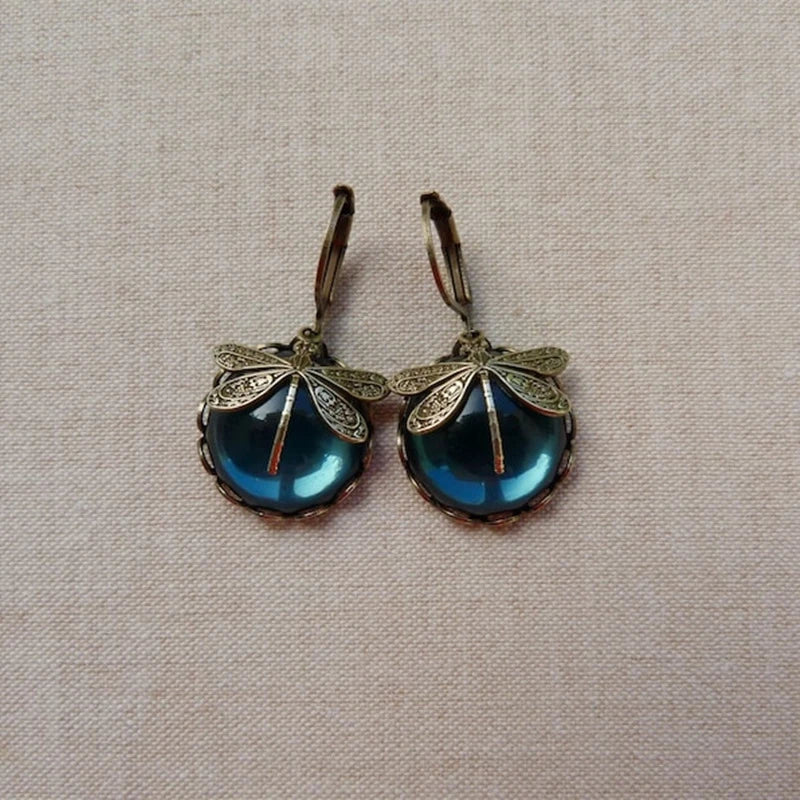 Antique Gold Dragonfly Earrings with a Spherical Design
