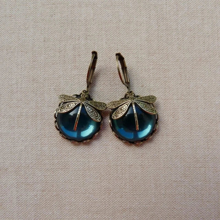 Antique Gold Dragonfly Earrings with a Spherical Design